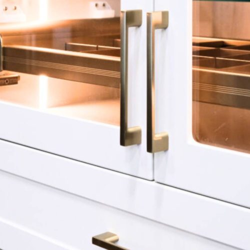glass closet doors with gold vogue handles
