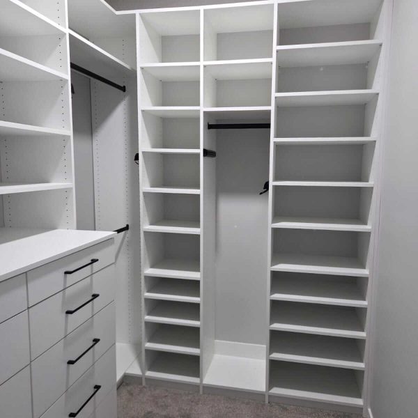 a redesigned custom walk-in closet