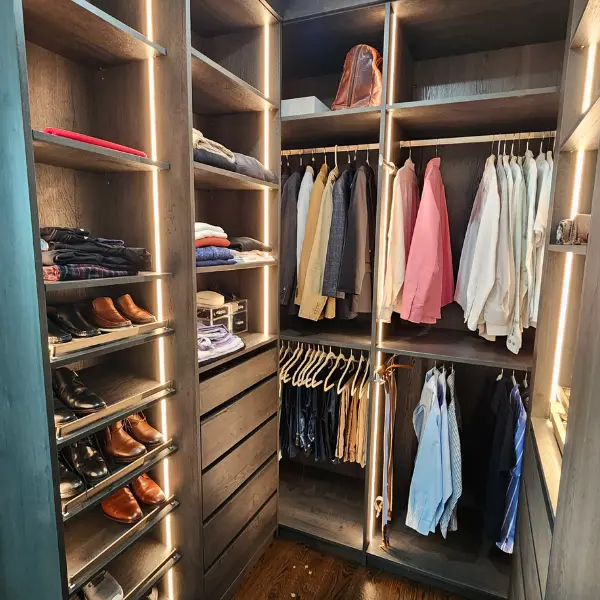premium-closet premium walk-in closet with lighting, drawers, shoes shelves, hanging sections.